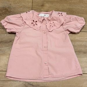 Pink raffle neck girl’s top